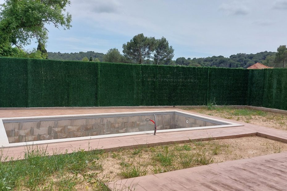 Seto Artificial Nacional en la valla de jardín de un cliente satisfecho